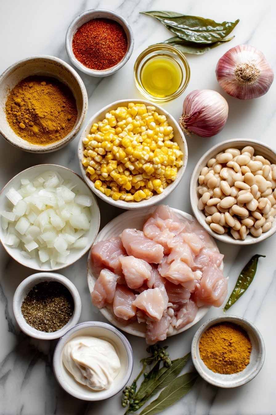 Flat lay of diced boneless skinless chicken breasts, diced large onion, minced garlic cloves, drained great Northern beans, mild green chiles with juices, fresh corn kernels, chili powder, ground cumin, dried oregano, and a small bowl of creamy sour cream beautifully arranged with vibrant colors and textures, placed on a white marble surface, photo taken with an iphone --ar 2:3 --v 7 - Creamy White Chicken Chili, white chicken chili, easy white chicken chili, healthy chicken chili, comforting chicken chili