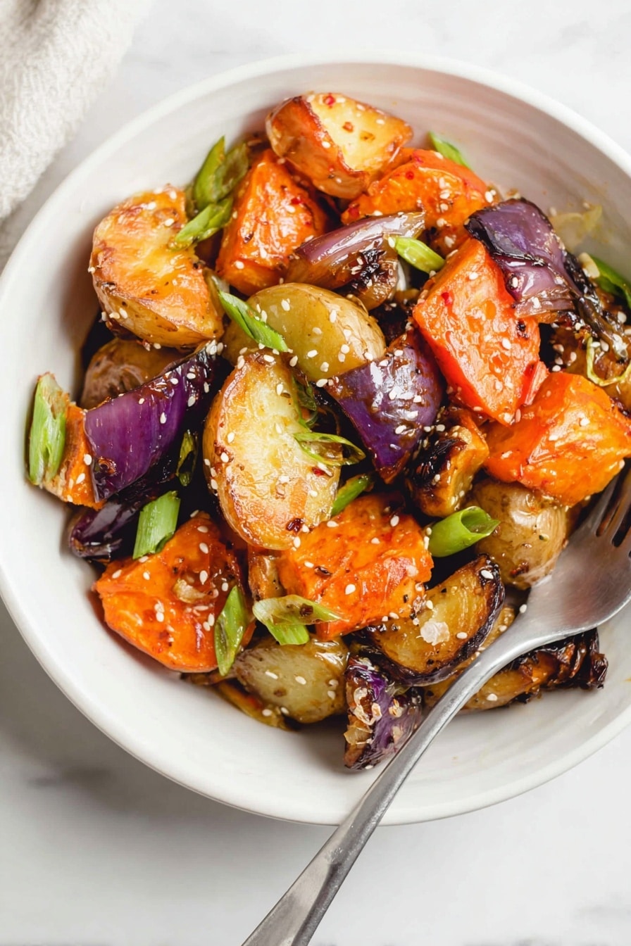 A white bowl filled with three layers of roasted vegetables, including orange sweet potatoes, light golden potatoes, and purple onions. The vegetables have a slightly charred texture with some browned edges and are sprinkled with white sesame seeds. Bright green scallion pieces are mixed among the vegetables, adding contrast. A silver fork is placed inside the bowl on the right side, resting on a white marbled surface. photo taken with an iphone --ar 2:3 --v 7 - Miso Glazed Roasted Root Vegetables, roasted root vegetables with miso glaze, healthy miso vegetable side dish, flavorful root veggie recipes, vegan roasted root vegetables