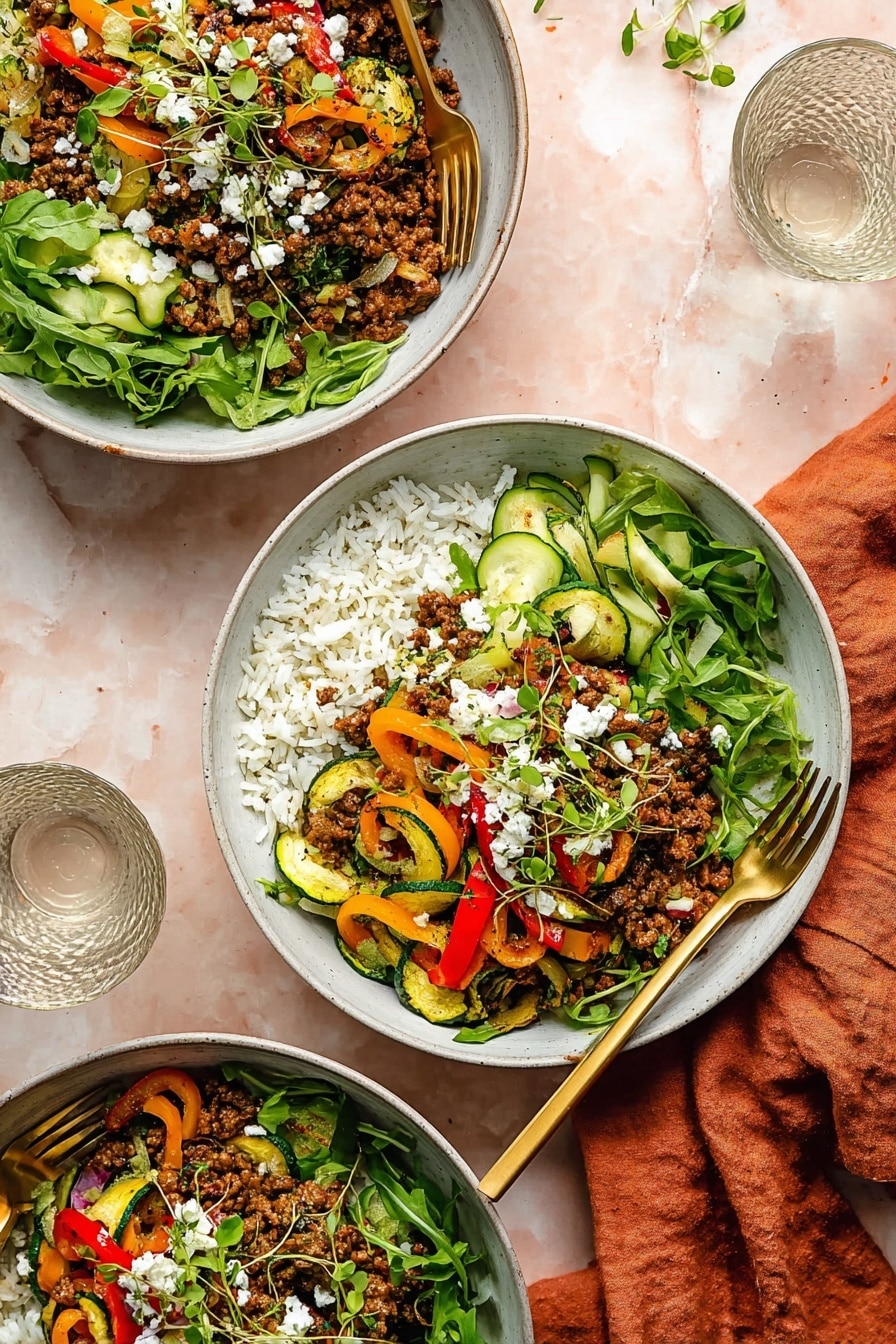 A white frying pan filled with cooked ground meat mixed with bright orange bell pepper strips and green zucchini slices, along with thin pieces of red onion, all seasoned with herbs and spices. The pan has a golden handle and a wooden spoon resting inside. Next to it are two light green plates stacked with golden forks on them, set on a white marbled surface. A dark red cloth is placed near the top right corner of the pan photo taken with an iphone --ar 2:3 --v 7 - Mediterranean Beef and Veggie Skillet, Mediterranean Beef and Veggie Skillet recipe, healthy beef skillet dinner, quick Mediterranean beef meal, one-pan beef vegetable dish